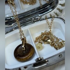 Necklace with pendant eye tiger